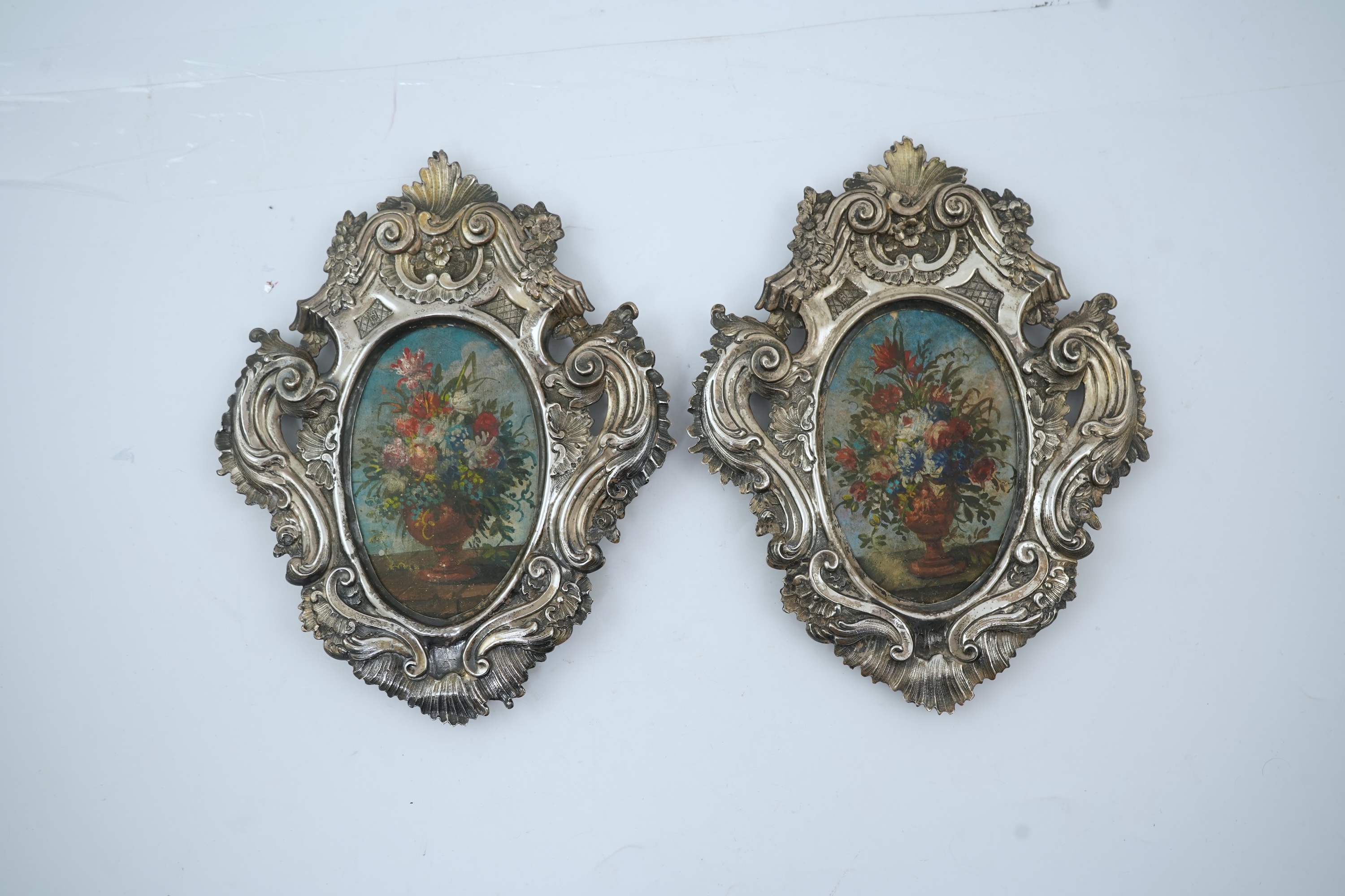 A pair of 18th century Italian Rococo repousse silver frames